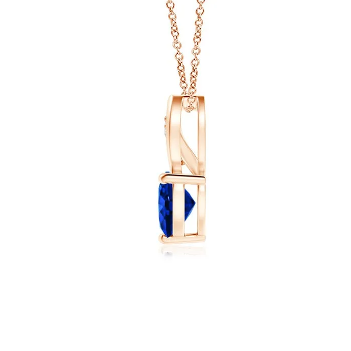 1.3 CT. Heart-Shaped Blue Sapphire Pendant with White Sapphire Accents